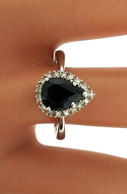 1.00ct Sapphire & 0.10ct Diamond Halo Ring- 9ct White Gold 2.57g