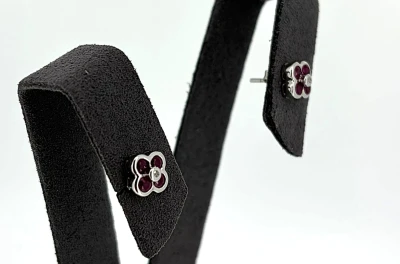 0.70ct Ruby & 0.02ct Diamond Stud Earrings -9ct White Gold 1.5g